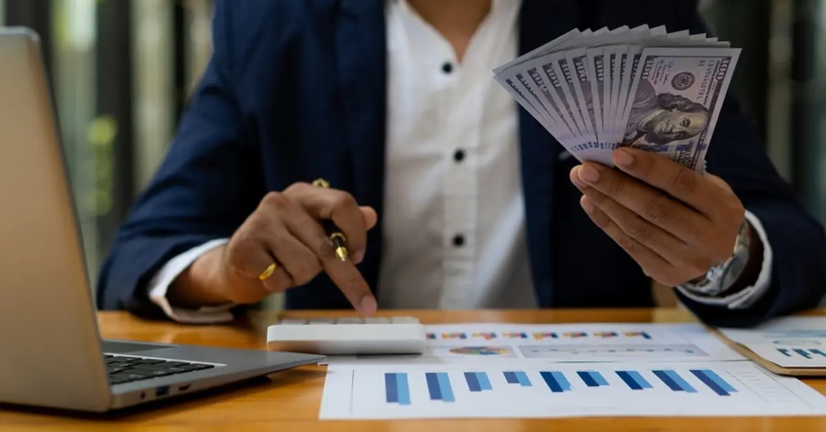 How to Manage Cash Flow in a Home Business -- A man managing cash flow