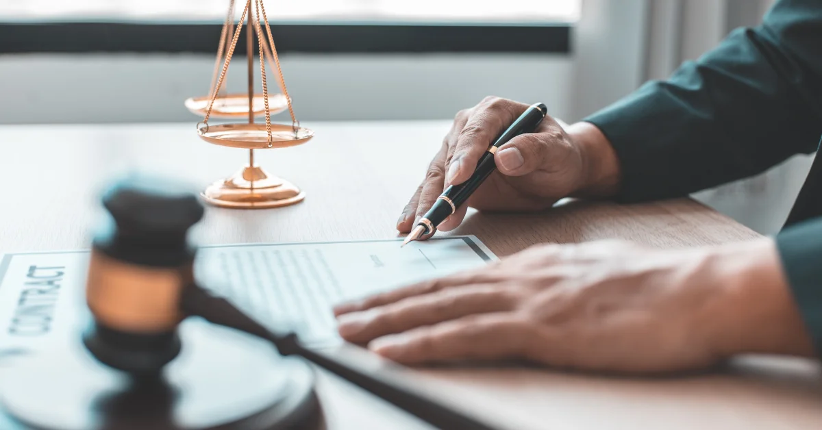 a lawyer with pen in his hand