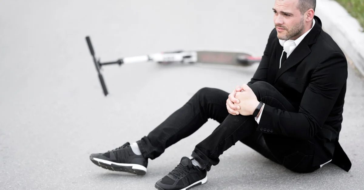 man holding his knee