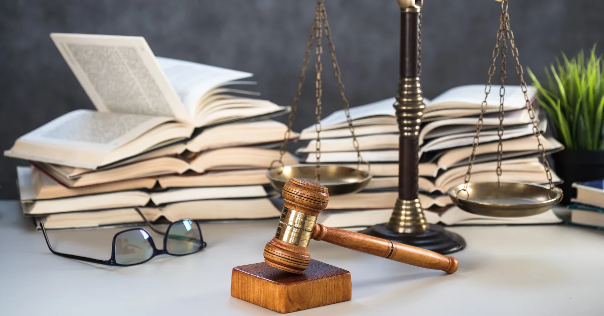 books, glasses, and a gavel