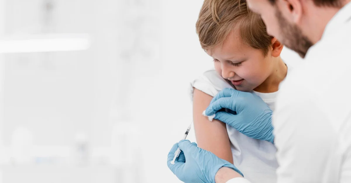 a child boy being vaccinated