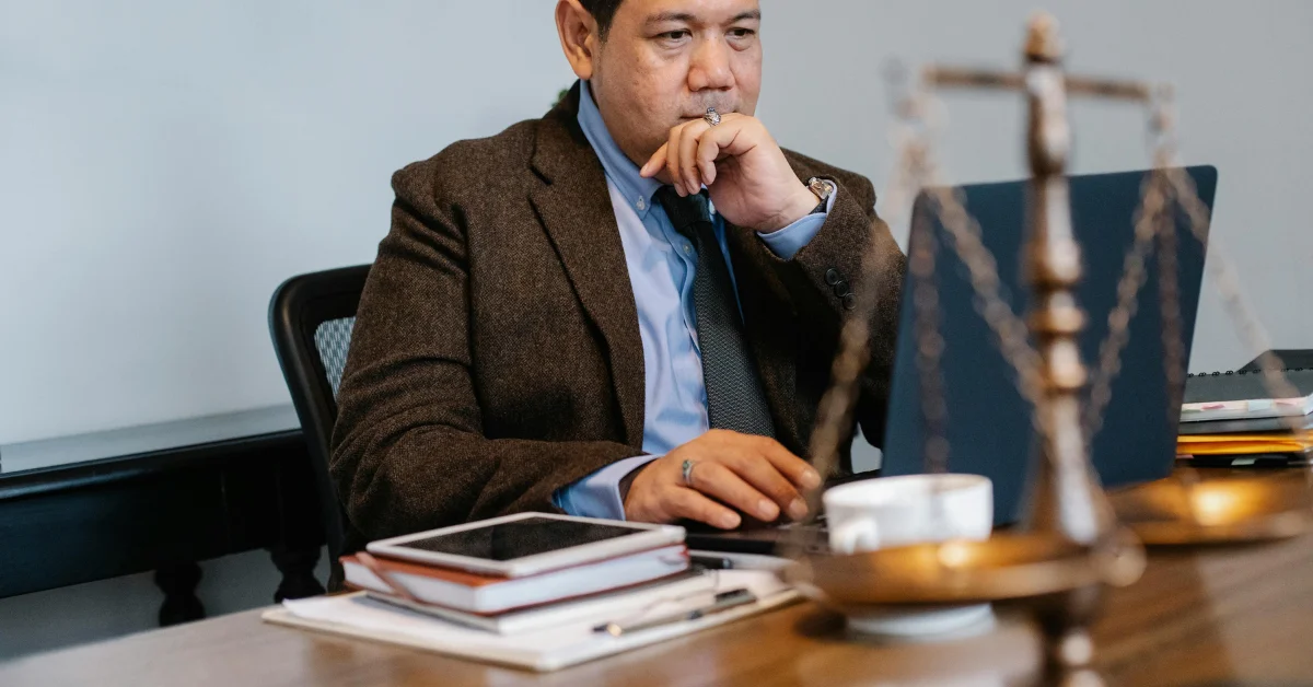 a lawyer using a laptop