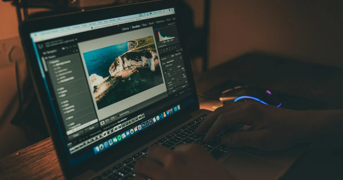 a man editing a video on laptop