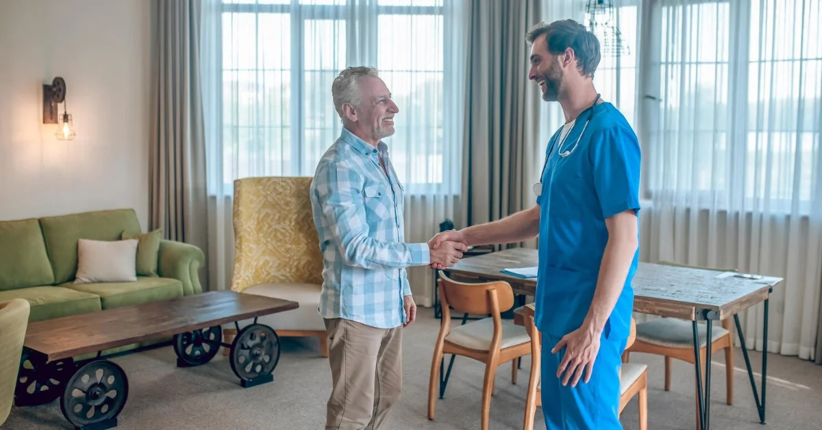 senior man shaking hand with his physician