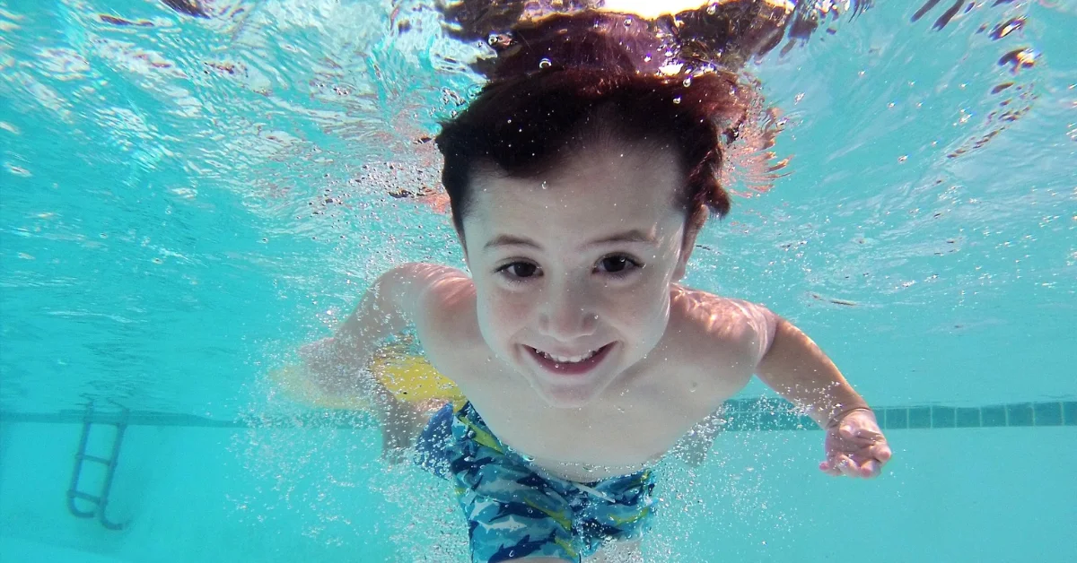 a kid swimming