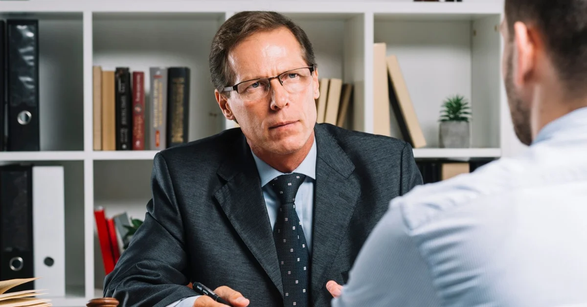 a husband consulting with a lawyer