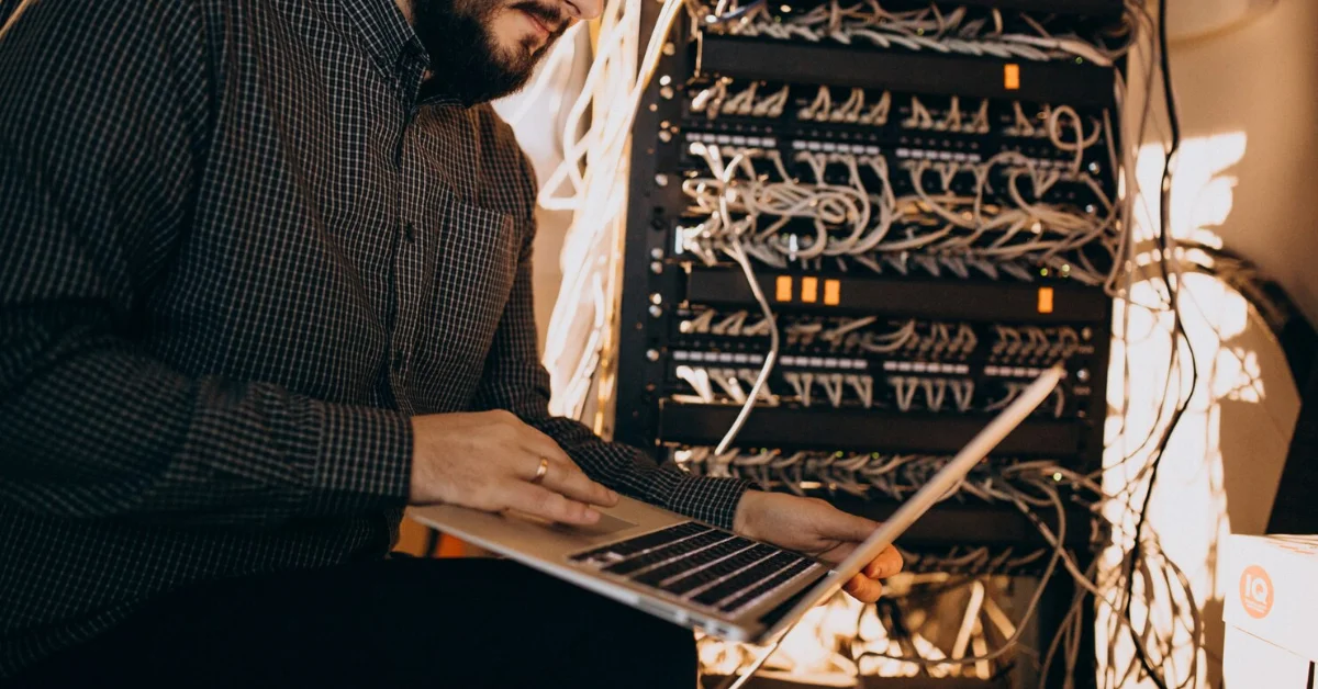 a man testing network on laptop