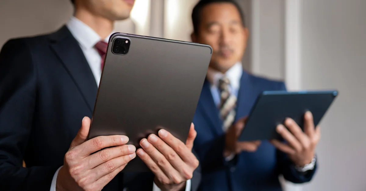 team members using ipads